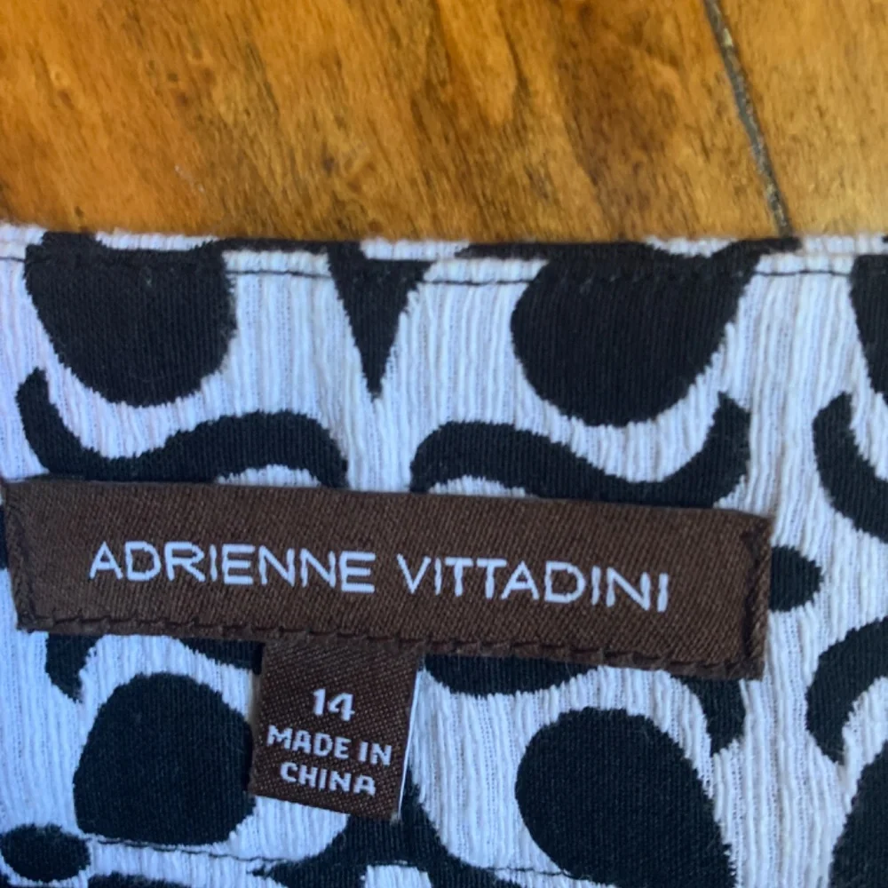 Adrienne vittadini 100 percent‎ cotton logo button skirt. Never worn. Retail 120